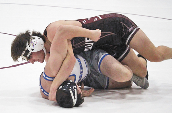 Wolves wrestler takes heavyweight championship at Killdeer tournament